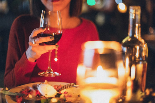 A Woman With Wine Glass in Romantic Dinner