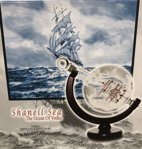 "Shanell Sea The Ocean of Vodka bottle with globe-shaped decanter and sailing ship artwork in background"