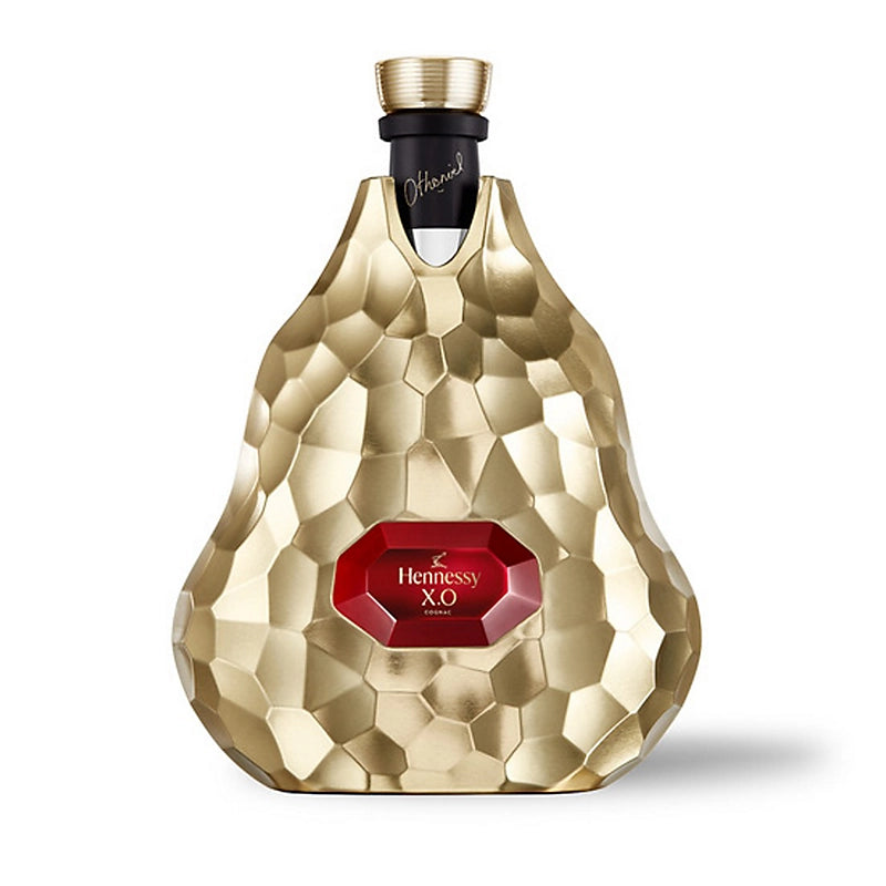 Hennessy XO Limited Edition by Jean-Michel Othoniel in a luxurious gold bottle with intricate design.