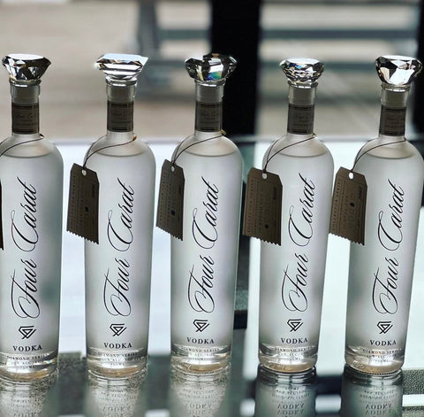 Four Carat Vodka Collectors Edition With Diamond Cut Closure (Full Set)